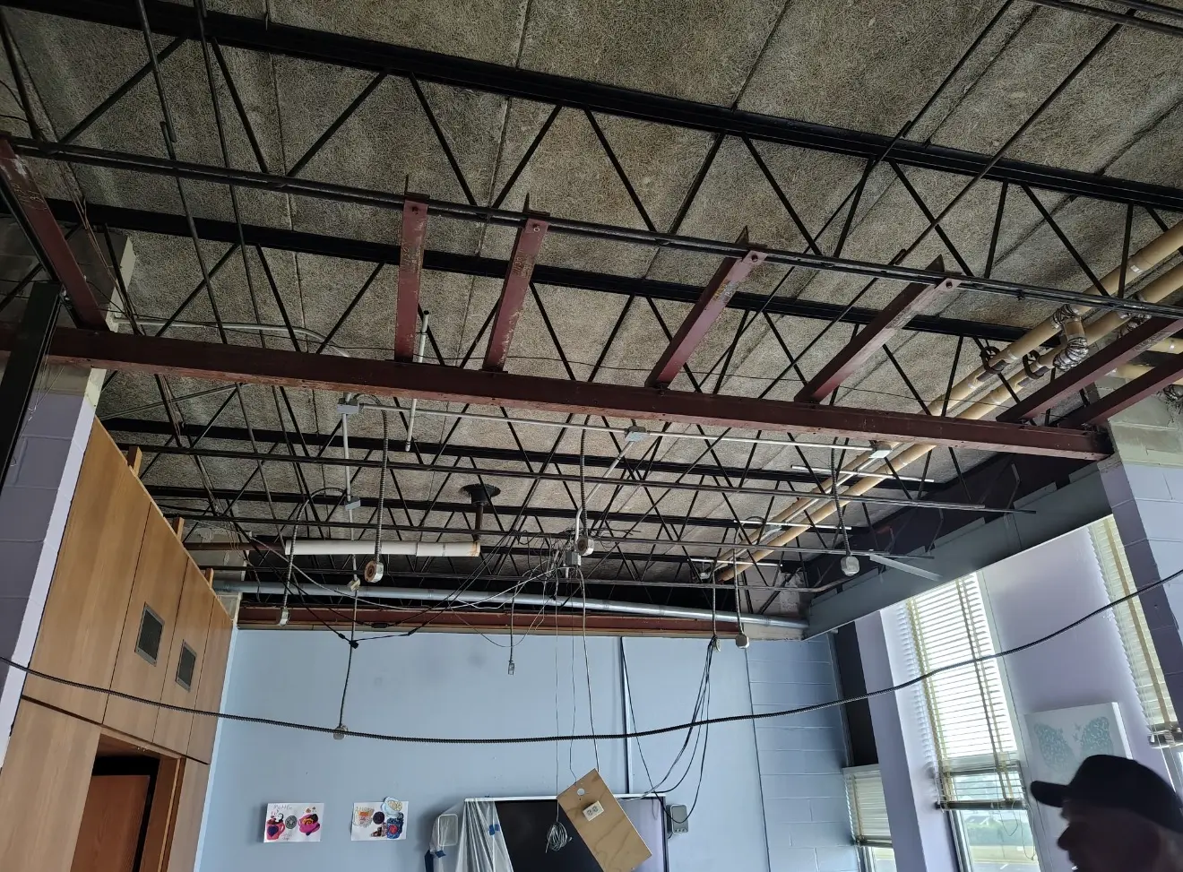 Commercial interior stripped to the steel structure during a build-out demolition